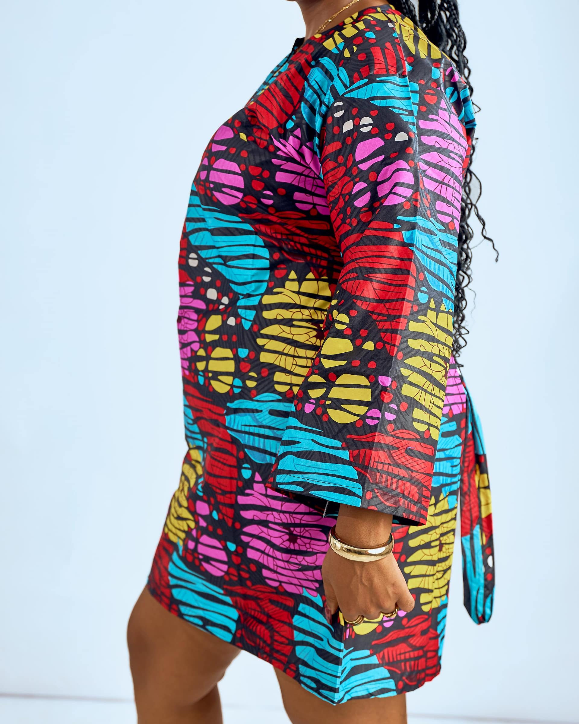 Bold patterned outfit, vibrant shift dress